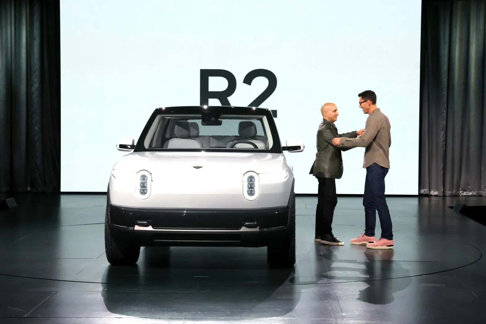 OCR-L-RIVIAN-TESLA-0331-R2.webp